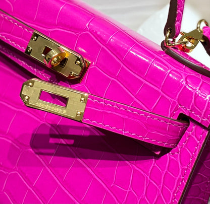 HM 25s Mini Kelly 19cm Deep Magenta Embossed Crocodile Gold Hardware