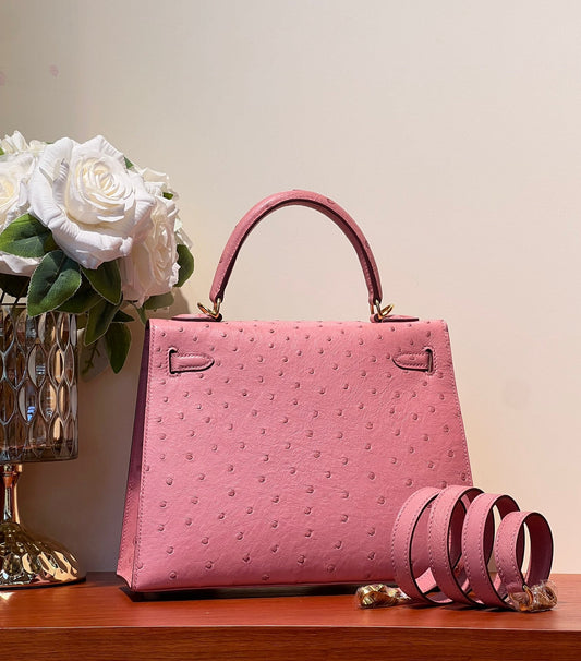 KELLY SELLIER 25 BAG IN SALMON PINK OSTRICH LEATHER WITH GOLD HARDWARE (MADE - TO - ODER)